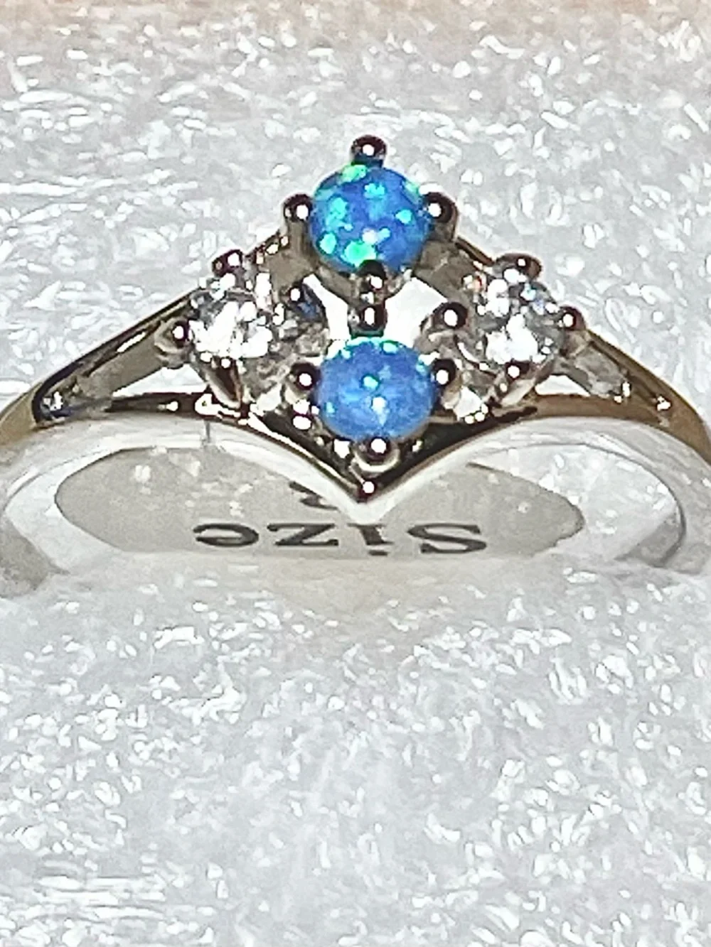 Blue Fire Opal and Cubic Zirconia Ring